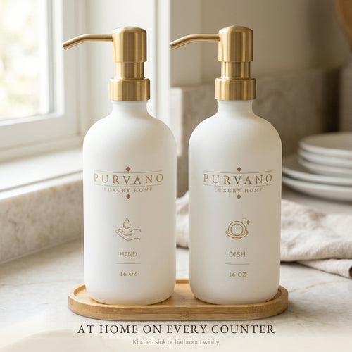 Matte white glass soap dispenser set on a kitchen bench beside a window