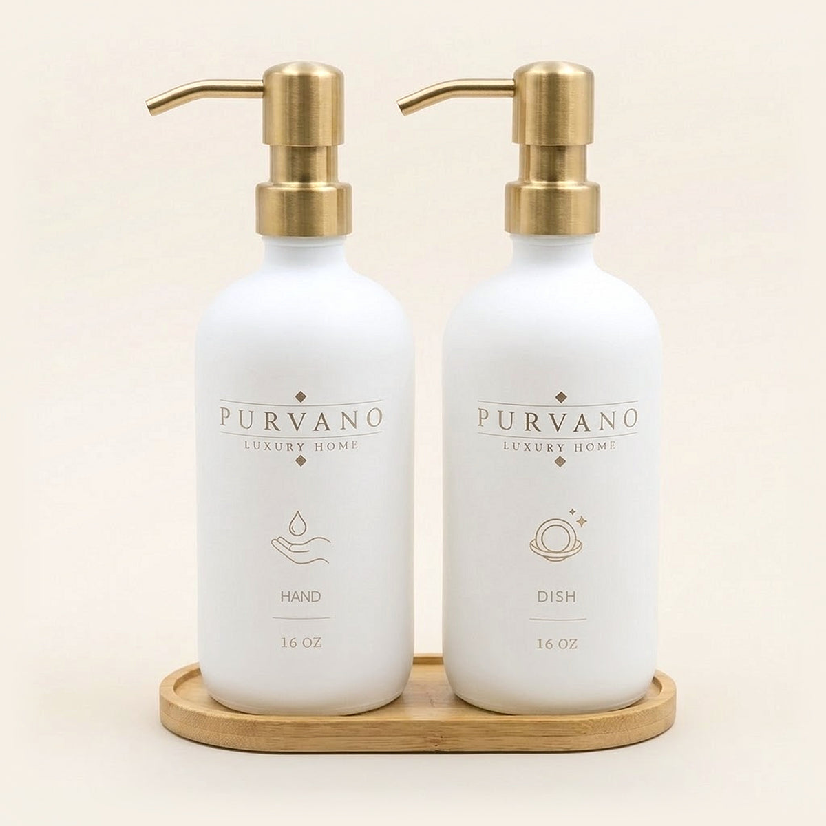 Two matte white glass soap dispensers, HAND and DISH, with brushed gold pumps on a bamboo tray